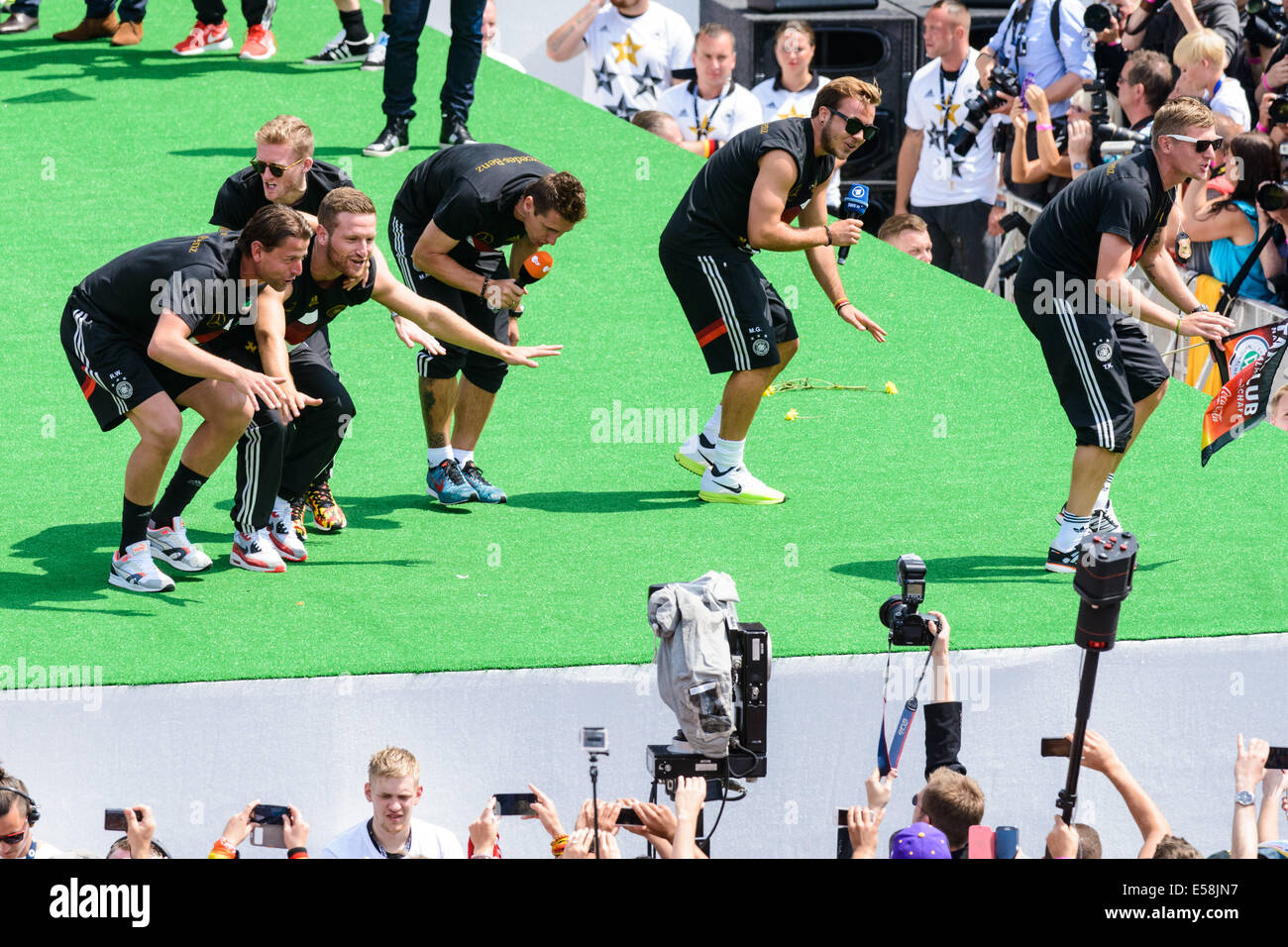 Berlin, Germany. 15th July, 2014. Mario Goetze, Andre Schund Miroslav Klose during the reception for the German national team at the so-called 'Fan Meile' at Brandenburg Gate in Berlin, Germany, 15 July 2014. The German team won the Brazilian 2014 FIFA Soccer World Cup final against Argentina © Action Plus Sports/Alamy Live News Stock Photo