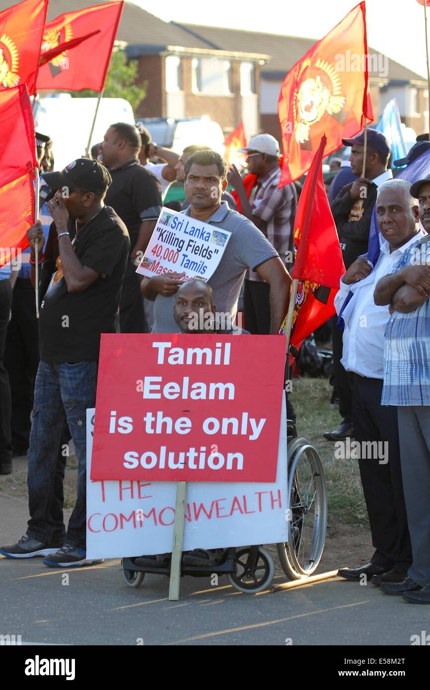 Glasgow, Scotland, UK. 23rd July 2014. Outside Celtic Park during the opening ceremony a large crowd noisily but peacefully protest against the treatment of Sri Lankans.  They are lobbying for the creation of an independent state, Tamil Eelam, and the suspension of Sri Lanka from the Commonwealth Credit:  Neville Styles/Alamy Live News Stock Photo