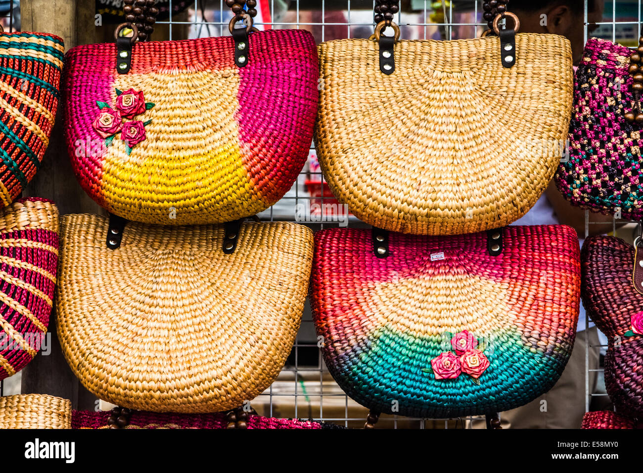 Colorfull handmade bags in a thai market. Stock Photo