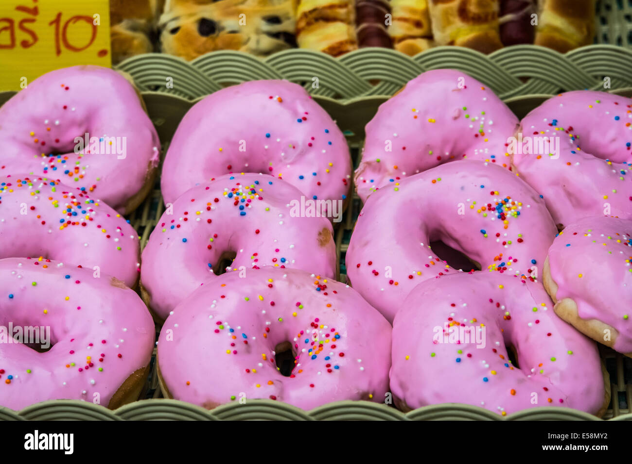 Glazed doughnuts, delicous desert in a nightmarket in Thailand. Ares a type of fried dough confectionery or dessert food. deep-f Stock Photo