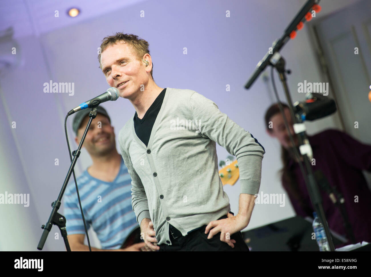 Glasgow, Scotland, UK. 23rd July, 2014. Stuart Murdoch of Belle and Sebastian performs at the kelvingrove bandstand as part of opening celebrations of the Glasgow Commonwealth Games 2014. Glasgow Scotland July 23rd. Credit:  Sam Kovak/Alamy Live News Stock Photo