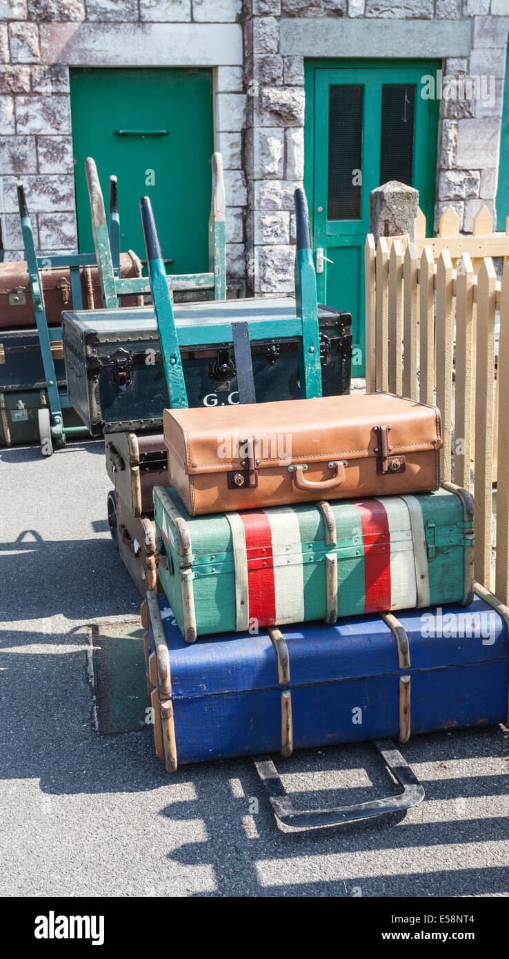 Period suitcases at railway station Stock Photo