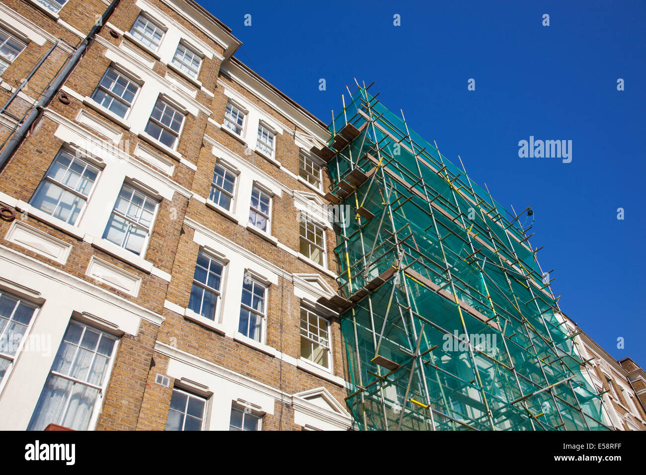 Renovation of Victorian apartment building facade in Royal College Street Stock Photo