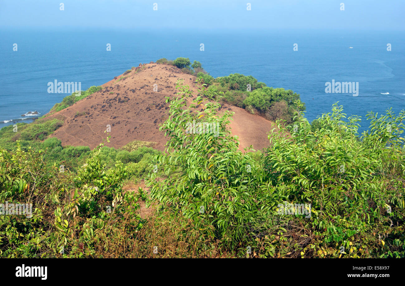 Goa Chapora fort bardez Goa Landscape of Cliff top view over Beach River Meeting Point Stock Photo