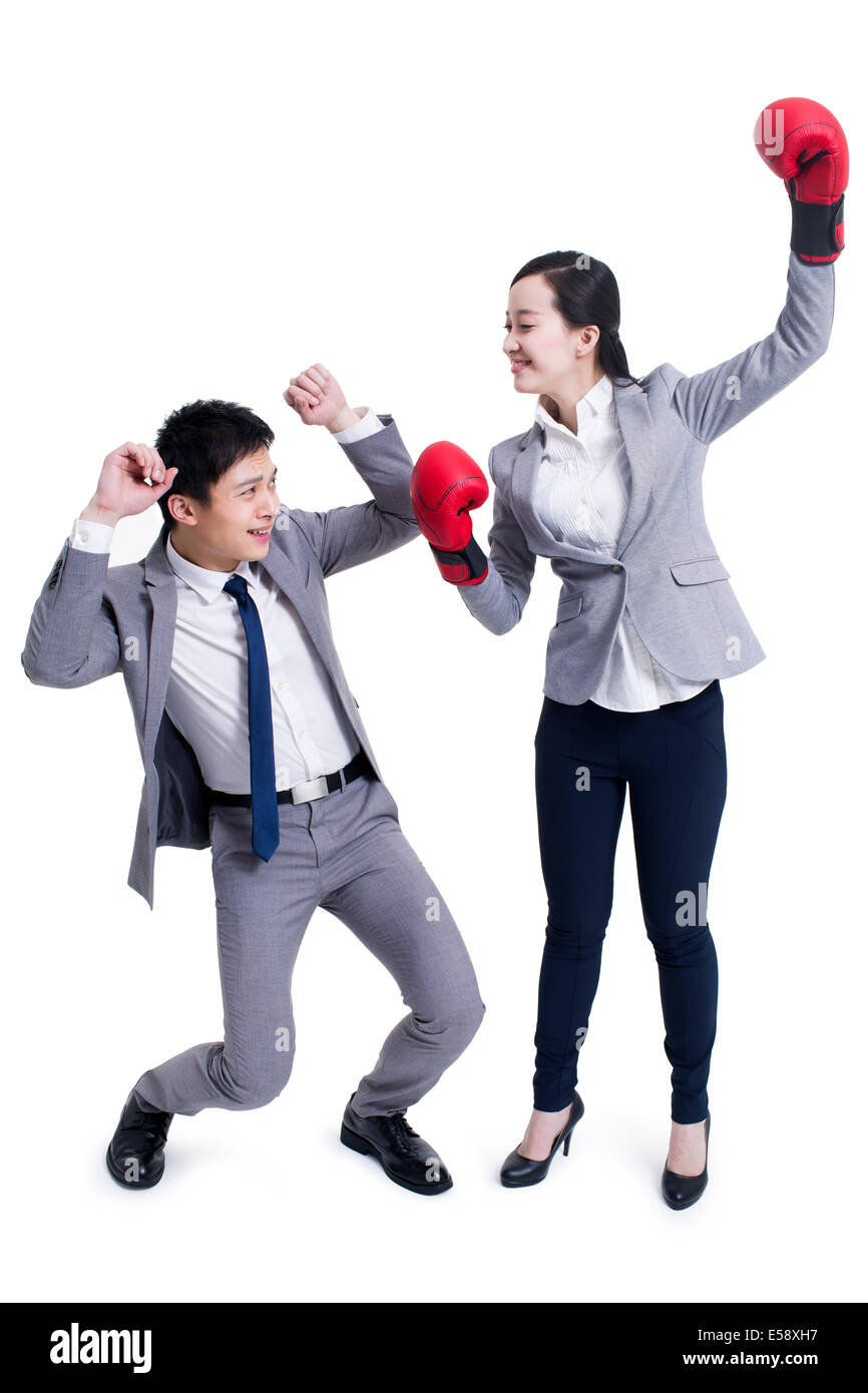 Two young business women fighting hires stock photography and images
