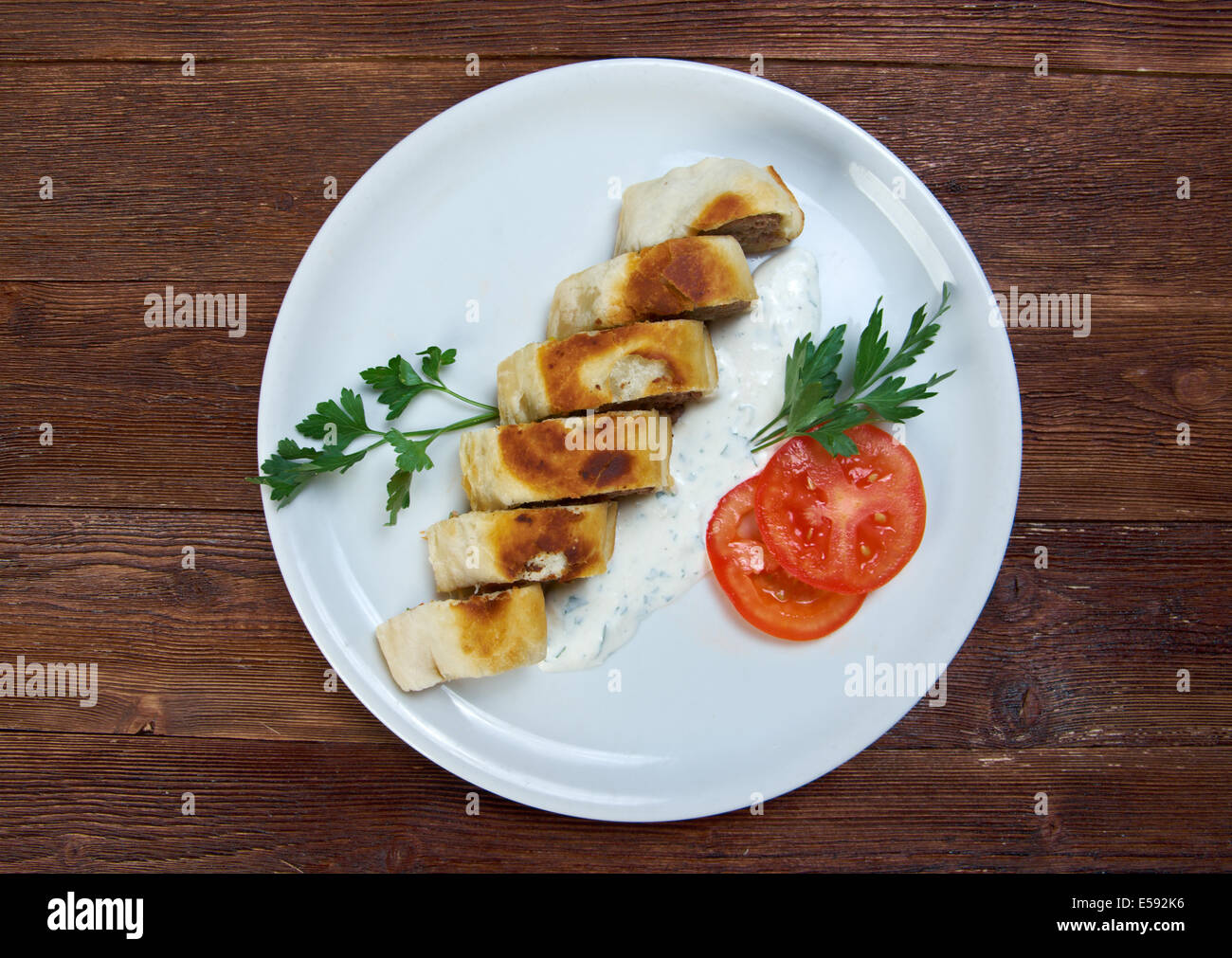 Turkish pide with beef meat and sauces Stock Photo