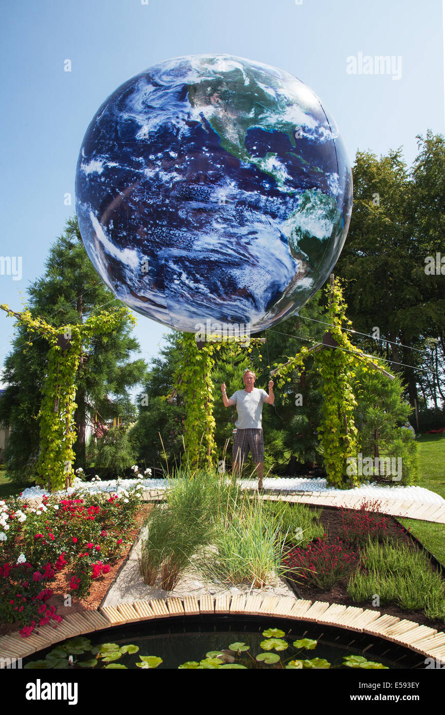 Blue Planet Earth Globe in Tatton Park, Manchester, UK. July, 2014. Circular images of Tethered Earth  Jonathen Price "Silver Medal" garden room, Inflatable floating Bubble Globe Balloon. Best in show winner at the RHS - Royal Horticultural Society themed event at Tatton Park. Stock Photo