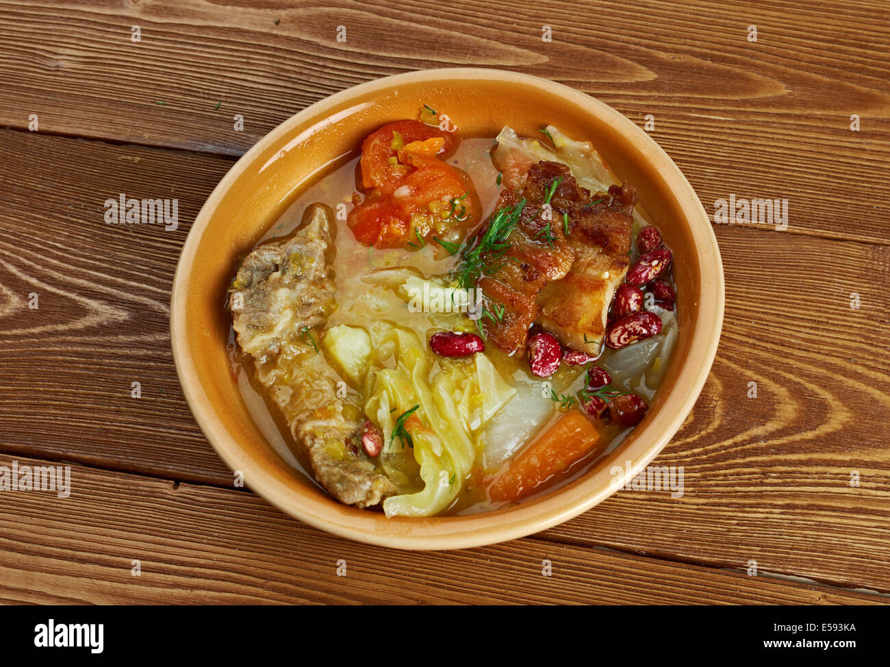 Olla podrida -  Spanish stew made from pork and beans, Stock Photo