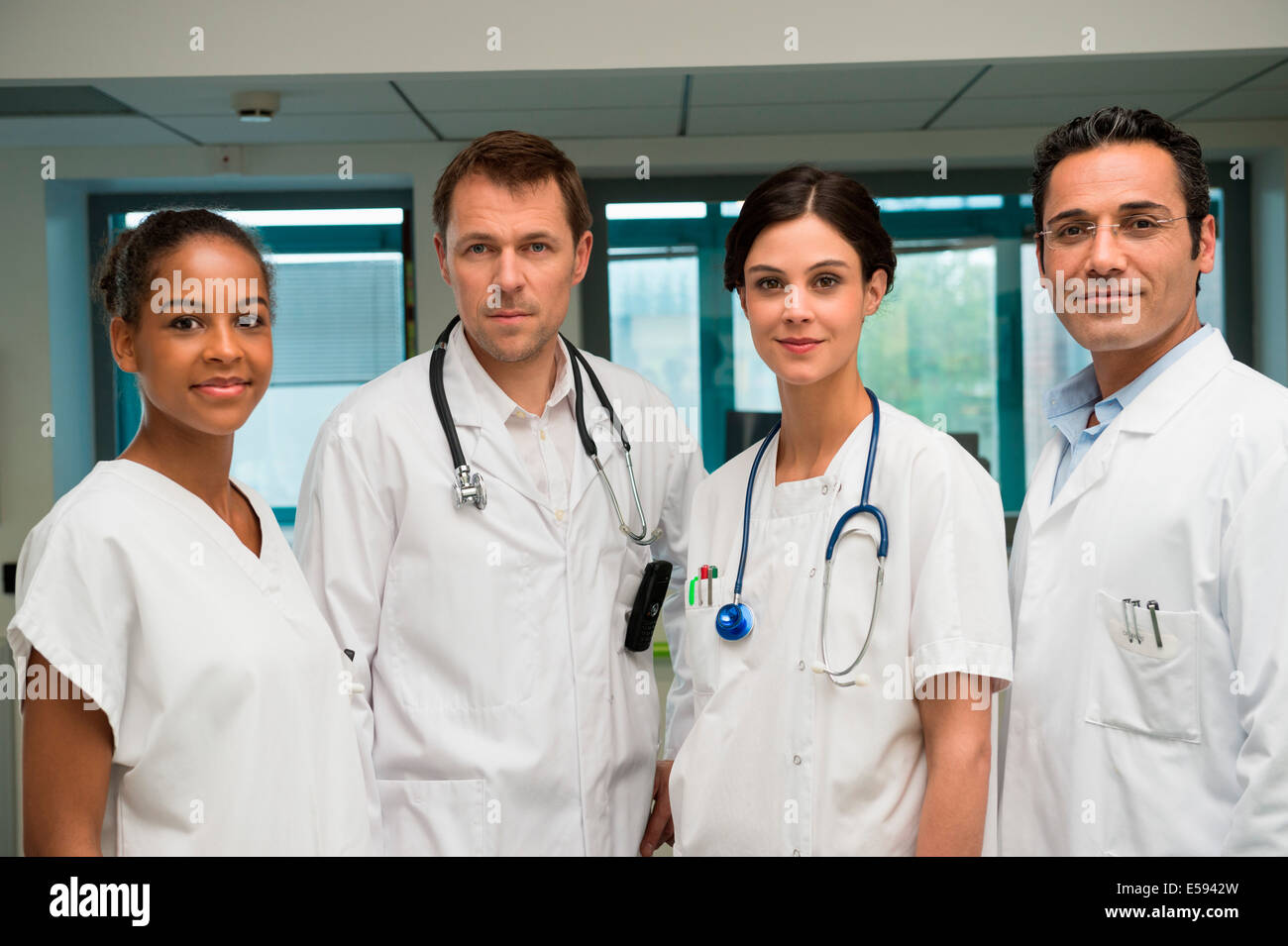 Portrait of a medical team smiling Stock Photo - Alamy
