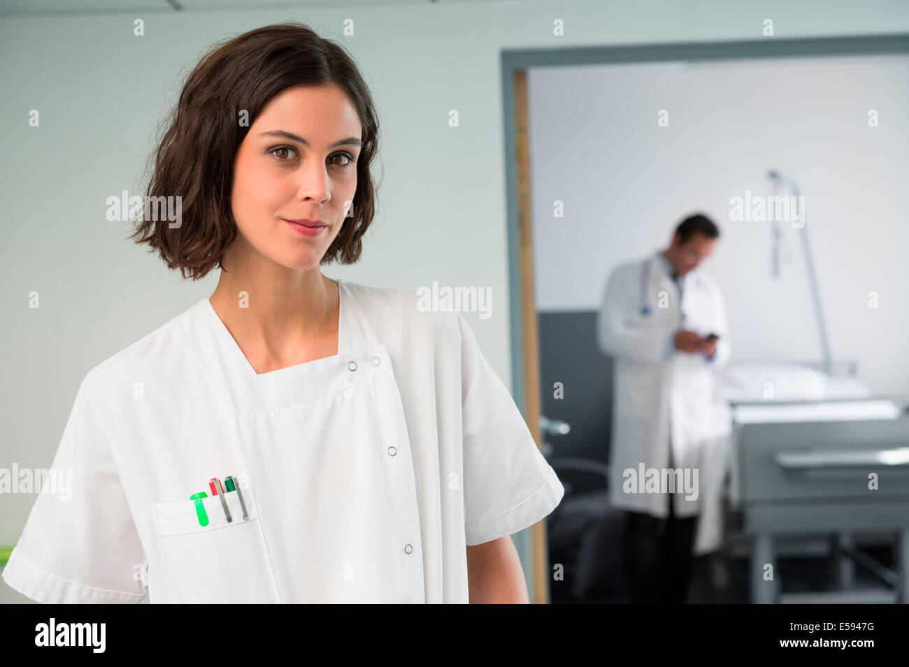 Young female doctor short hi-res stock photography and images - Alamy