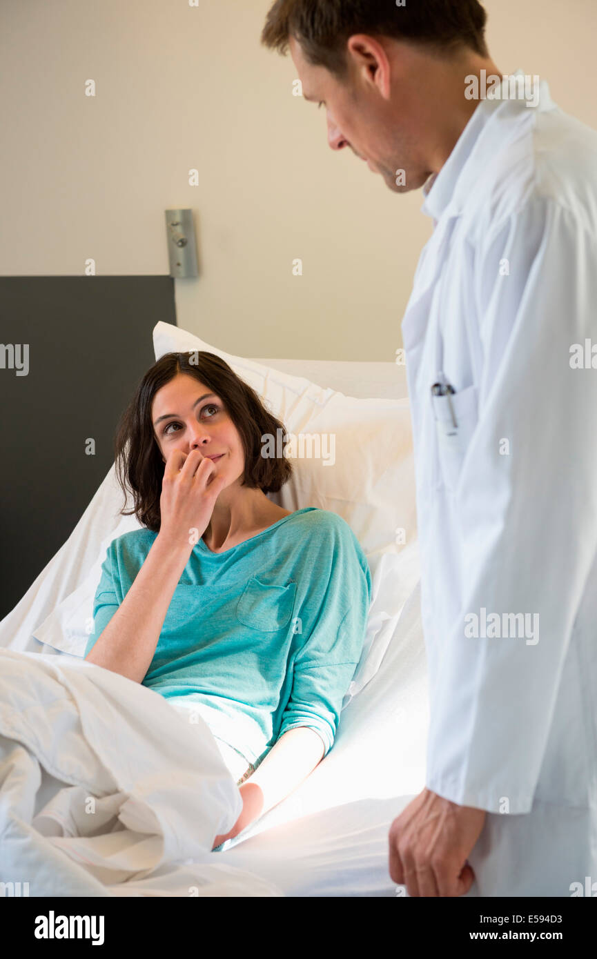 Male doctor attending a patient in a hospital Stock Photo Alamy