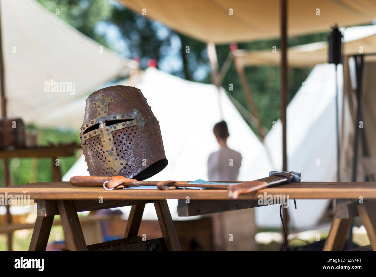 Medieval knights helmet and sword at the Tewkesbury medieval festival, Gloucestershire, England Stock Photo