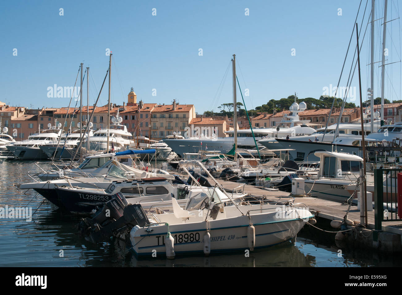 A selection of boats moored in the harbour at St Tropez, France Stock Photo