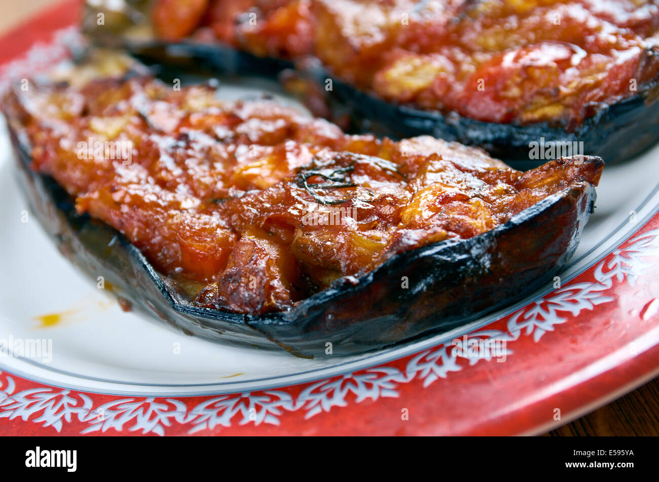 Imam bayildi dishes found in Turkish cuisine.whole braised eggplant stuffed with onion, garlic