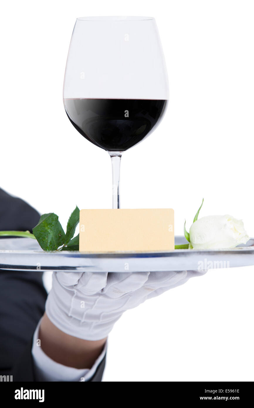 Waiter serving wine Stock Photo Alamy