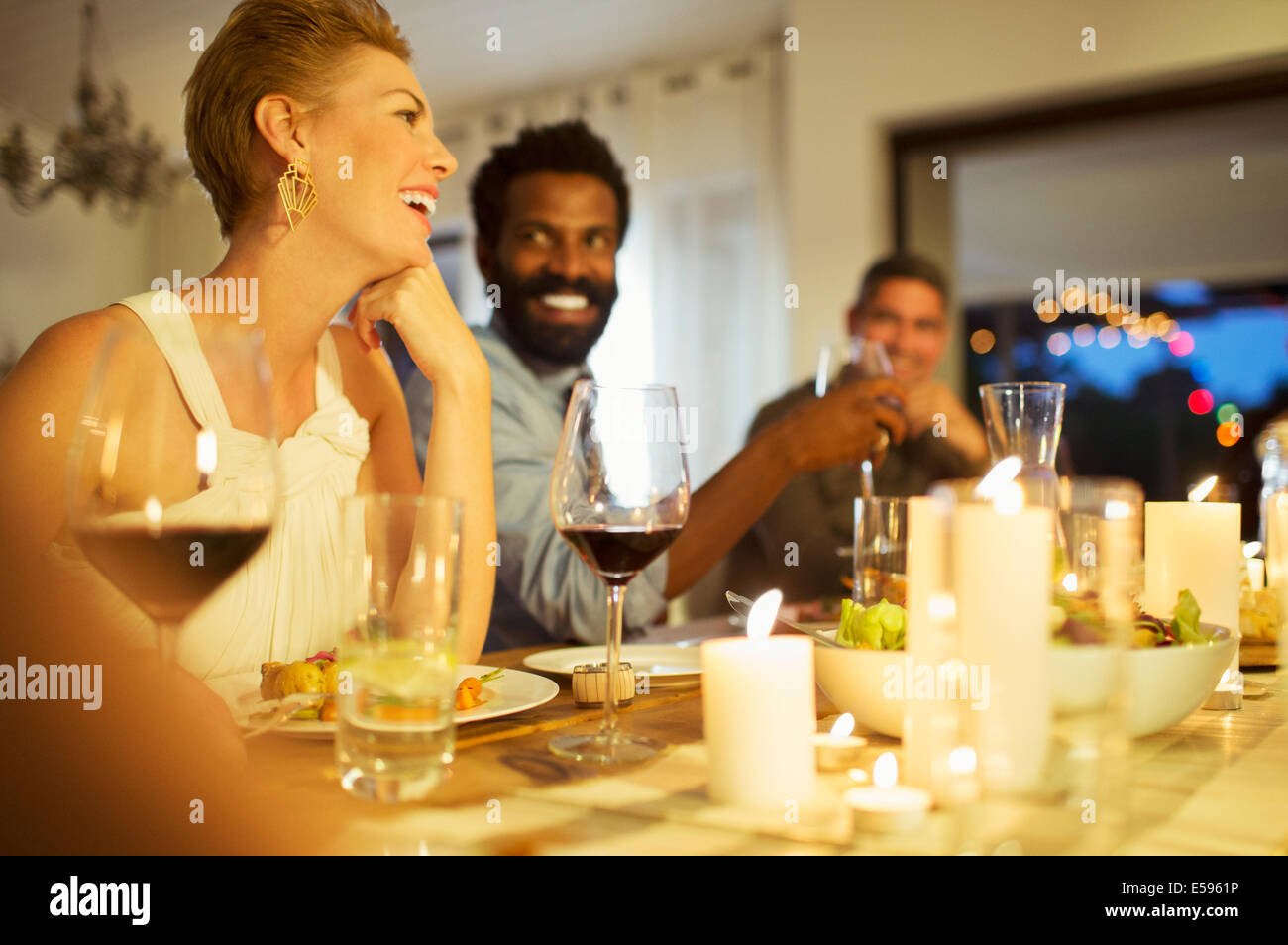Friends talking at dinner party Stock Photo Alamy