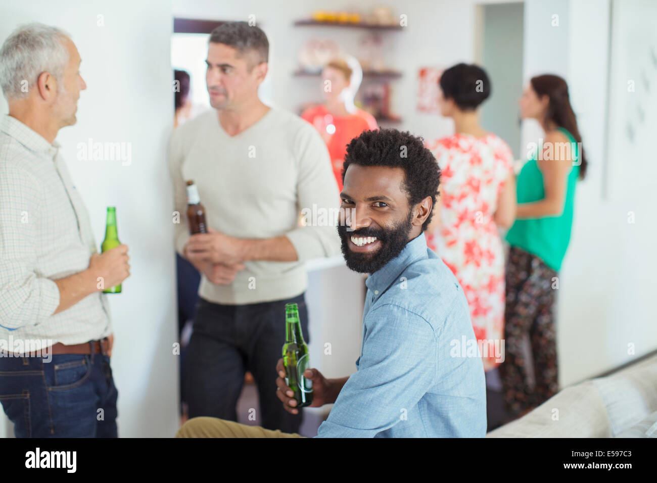 Man smiling at party Stock Photo