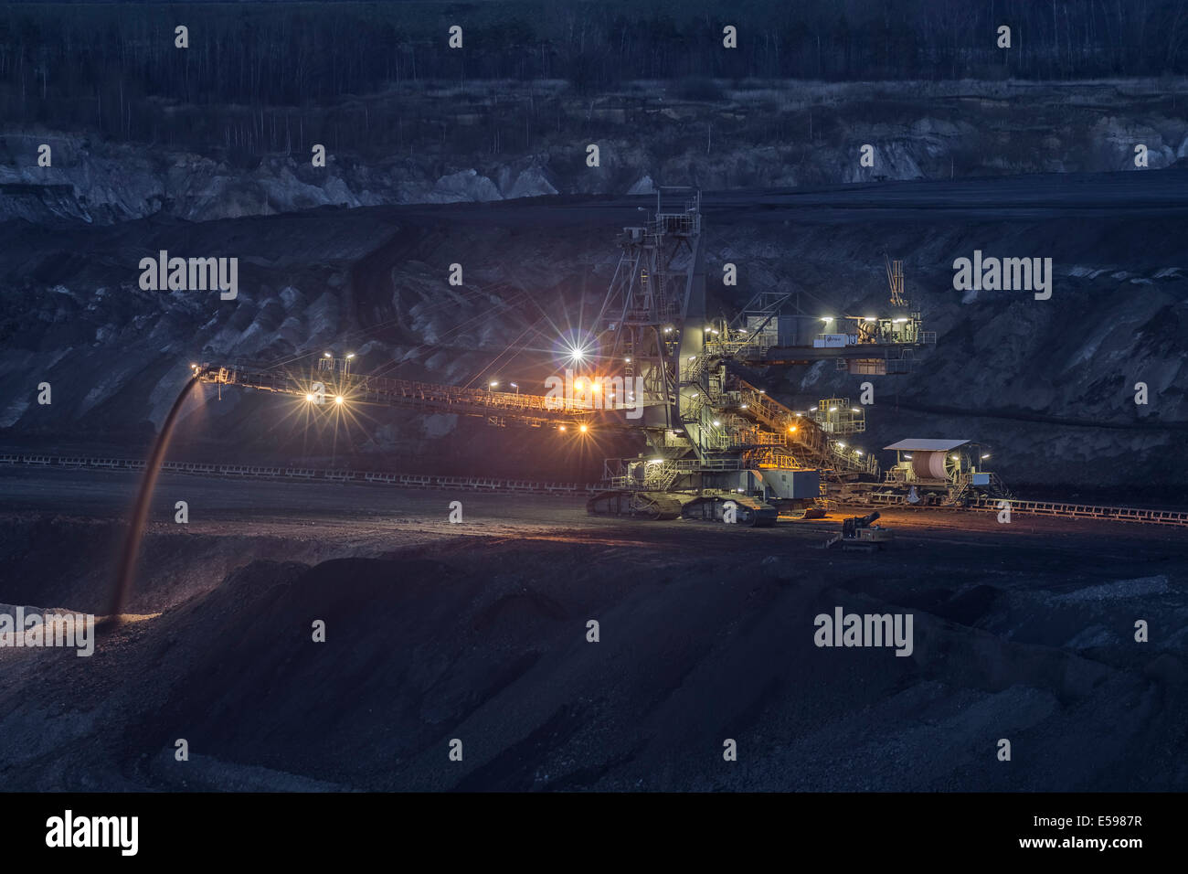 Germany, Lower Saxony, Schoeningen, Brown coal mining, Bucket-wheel excavator at night Stock Photo
