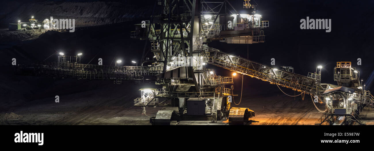 Germany, Lower Saxony, Schoeningen, Brown coal mining, Bucket-wheel excavator at night Stock Photo