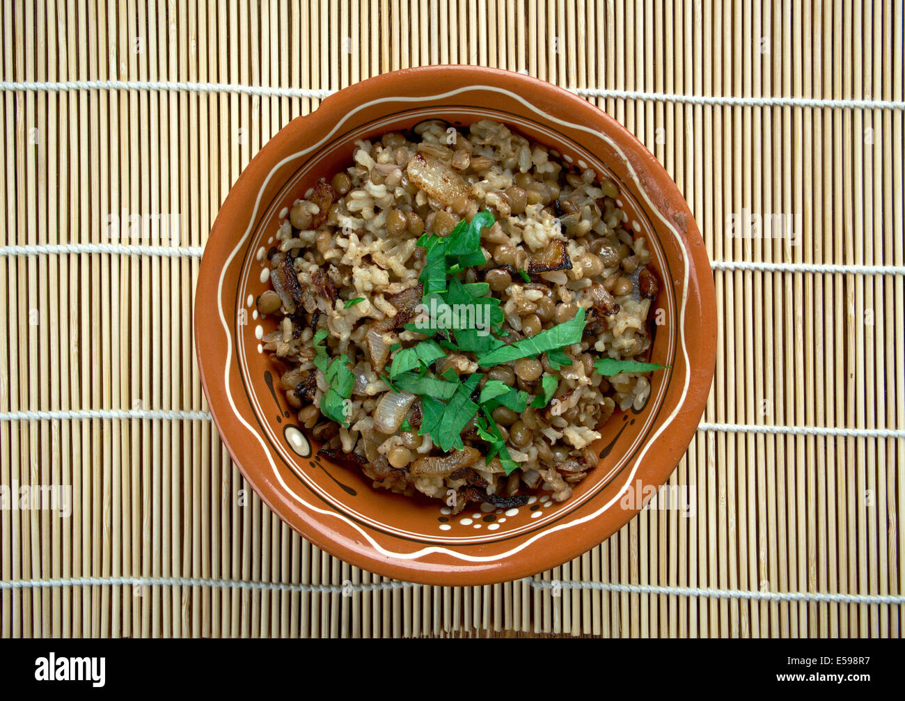 Mujaddara  is the Arabic lentils among the rice resemble pockmarks  saying in the Eastern Arab world Stock Photo
