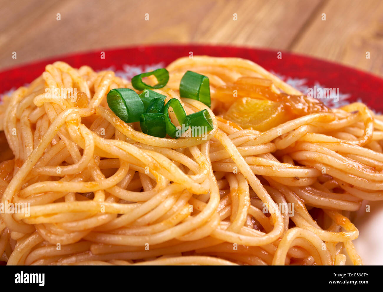 Pasta asciutta -   pastasciutta cooked pasta is plated and served with a complementary sauce or condiment Stock Photo