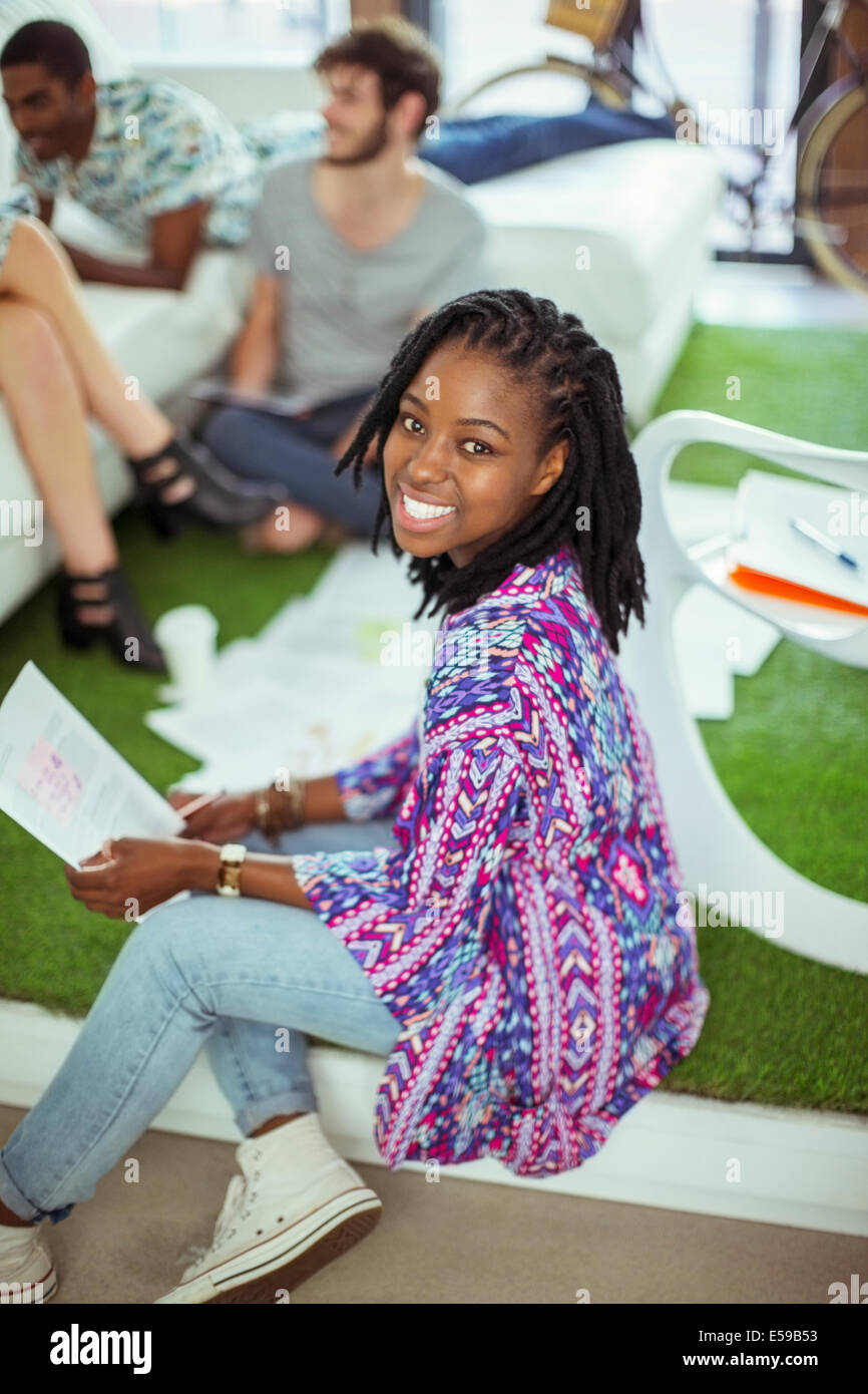 People smiling in office Stock Photo