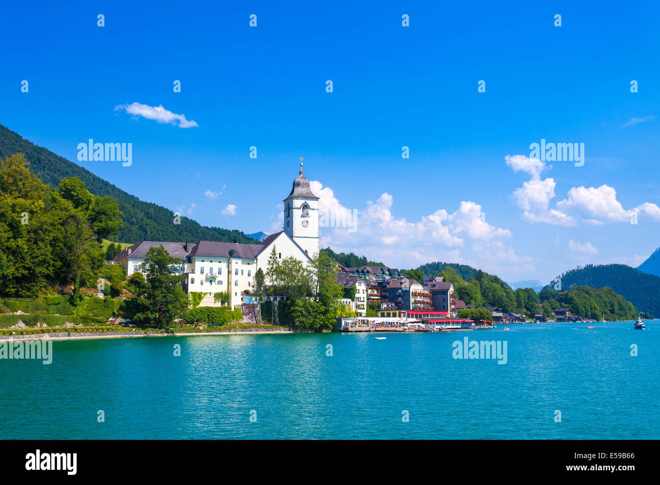 View of View of St. Wolfgang chapel and the village waterfront at Wolfgangsee lake, Austria Stock Photo