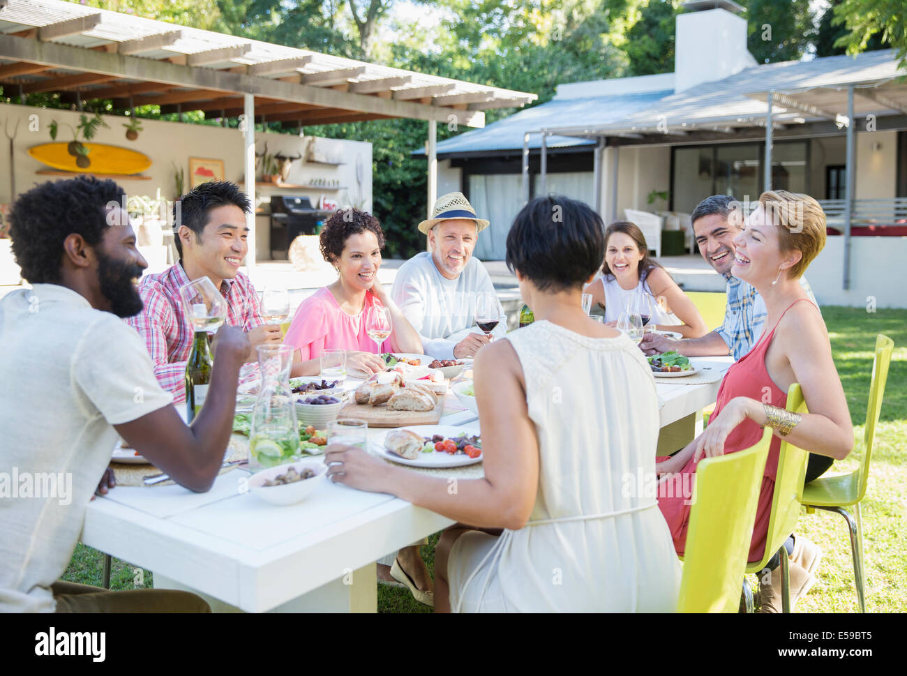 Friends talking at dinner party Stock Photo Alamy