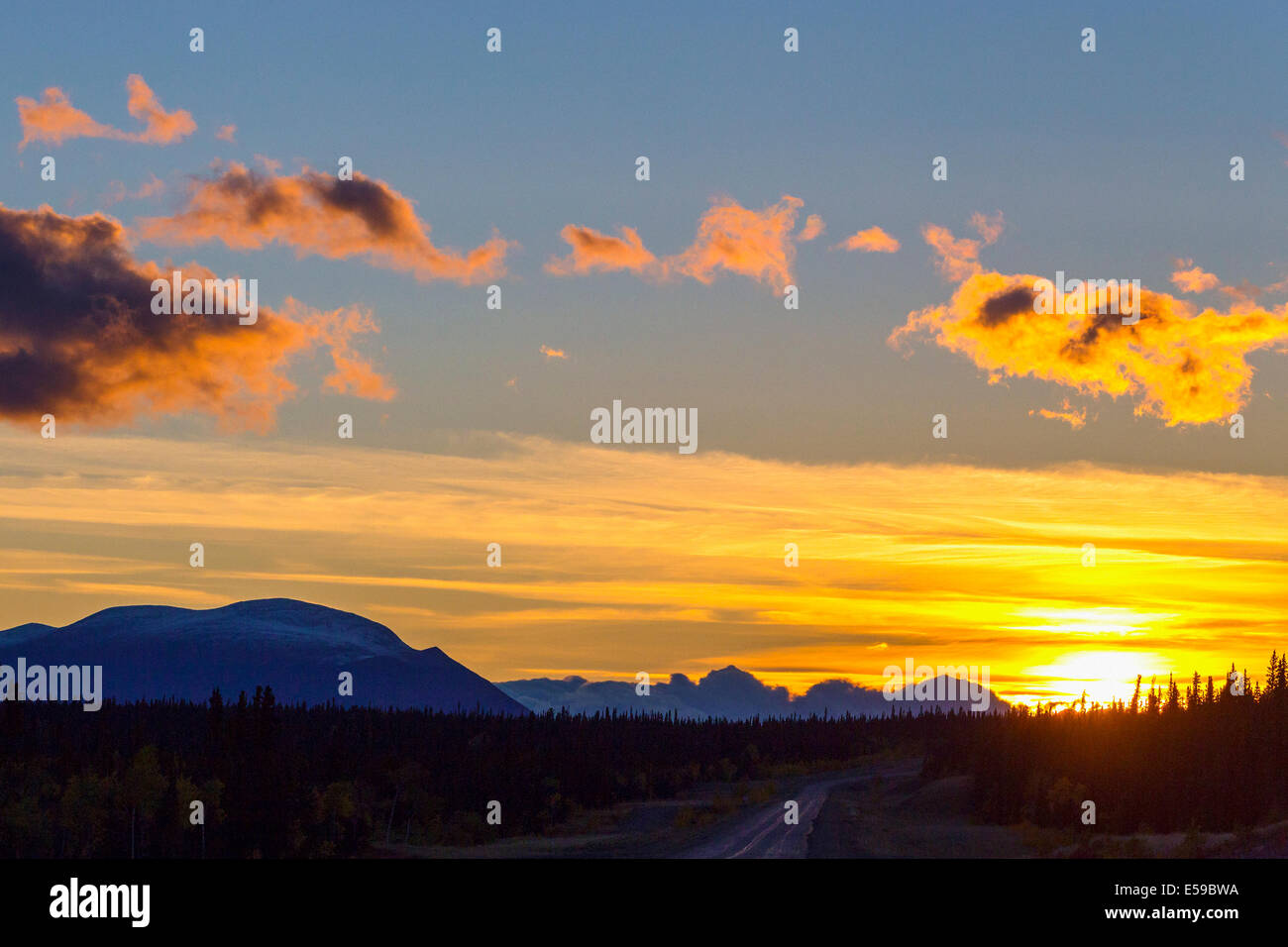 Sunset over Alaska Highway, USA Stock Photo