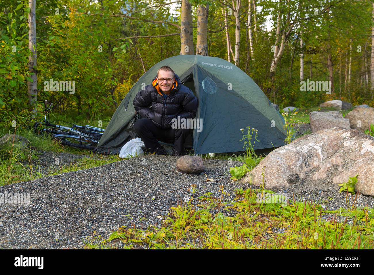 Tourist in front of his tent, Alaska, USA Stock Photo