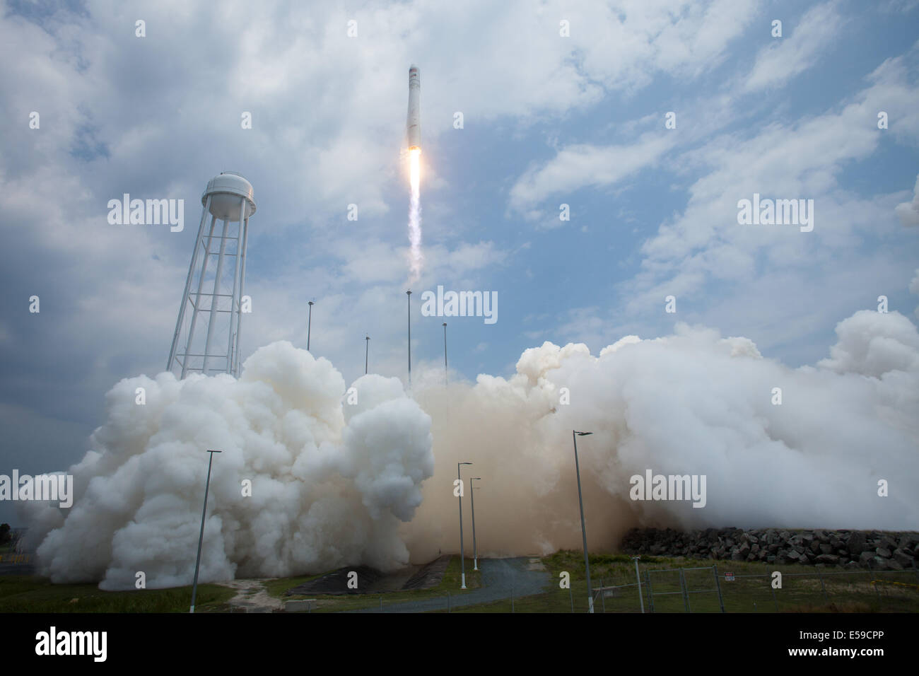 The Orbital Sciences Corporation Antares rocket launches from Pad-0A with the Cygnus spacecraft onboard, Sunday, July 13, 2014, at NASA's Wallops Flight Facility in Virginia. The Cygnus spacecraft is filled with over 3,000 pounds of supplies for the Inter Stock Photo