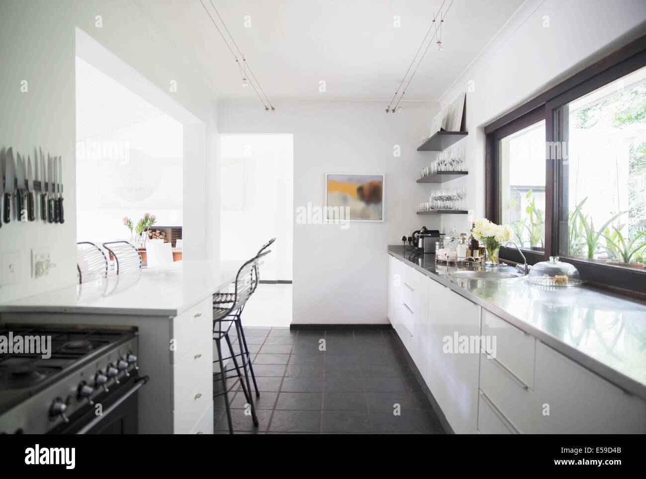 Counters and breakfast bar in modern kitchen Stock Photo