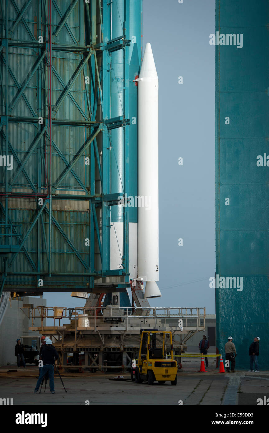 Workers monitor the progress of the rollback of the launch gantry from the United Launch Alliance Delta II rocket with the Orbiting Carbon Observatory-2 (OCO-2) satellite onboard, at Space Launch Complex 2, Monday, June 30, 2014, Vandenberg Air Force Base Stock Photo