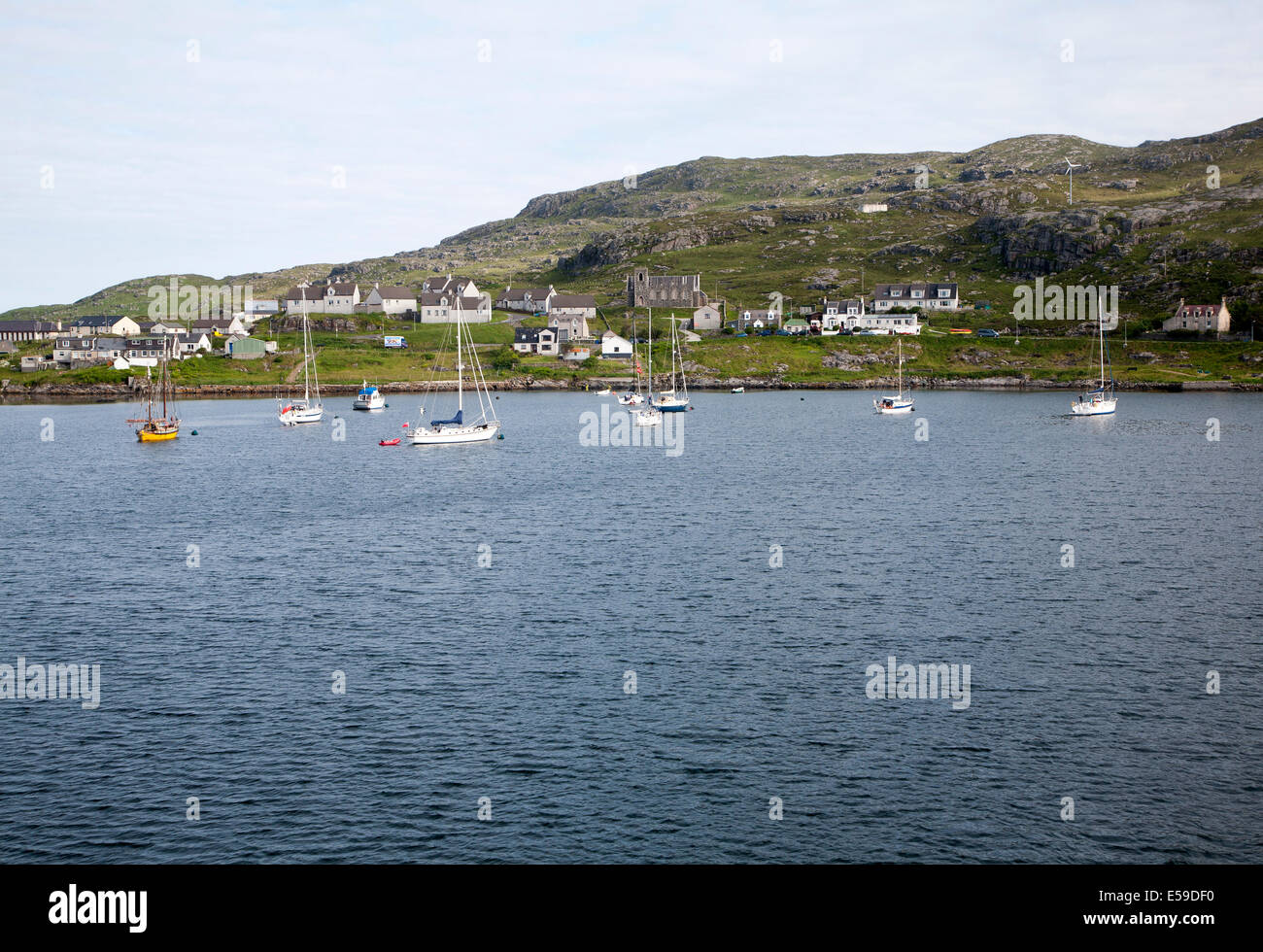 Yachts moored in the harbour at Castlebay, Barra, Outer Hebrides, Scotland Stock Photo