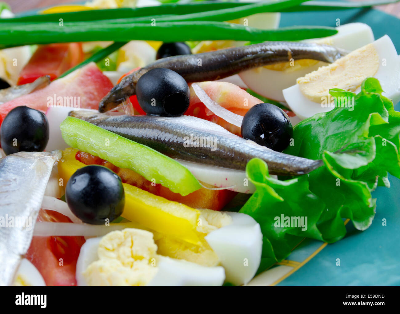 Nicoise Salad with anchovies composed salad of tomatoes, tuna, hard