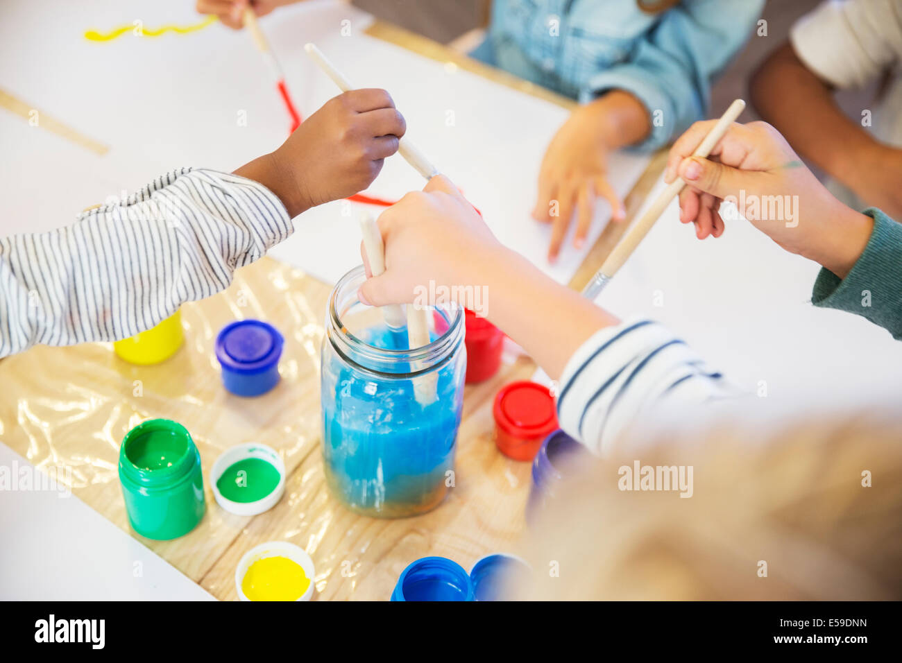 Students painting in class Stock Photo