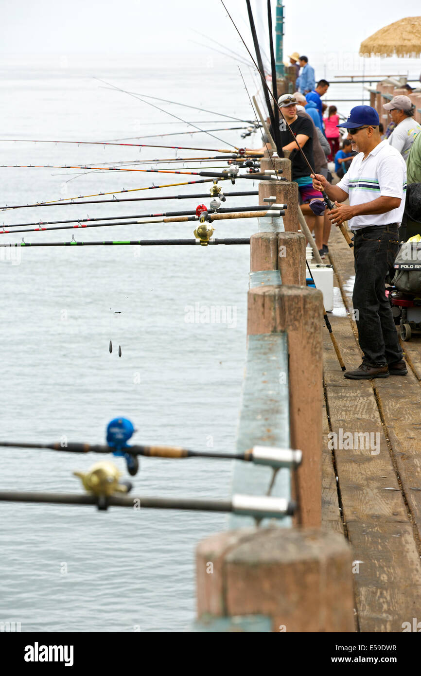 Many fishing rods hi-res stock photography and images - Alamy