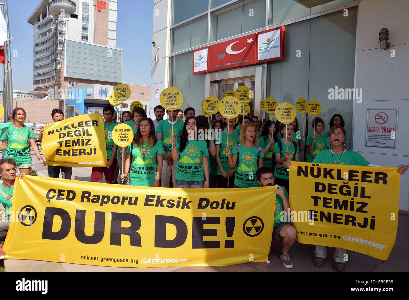 Ankara, Turkey. 24th July, 2014. Members of the Greenpeace protest in front of the Ministry of Environment and Urban Planning of Turkey against the construction of nuclear power plants in the country on July 24, 2014. Turkey has currently two nuclear power plants under construction. One is Akkuyu Nuclear Power Plant in the southern province of Mersin and the other to be built in the northern city of Sinop. Credit:  Xinhua/Alamy Live News Stock Photo