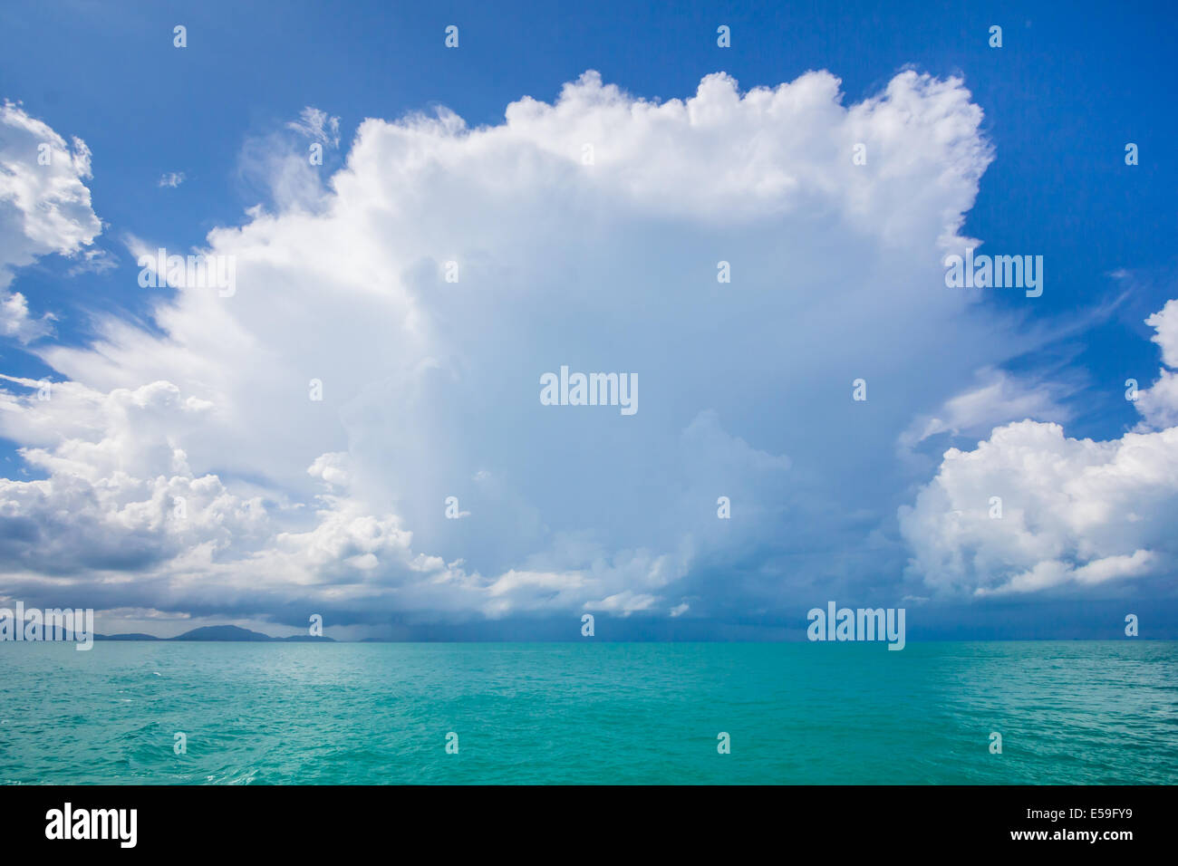 Rain Cloud sky sea blue landscape Stock Photo