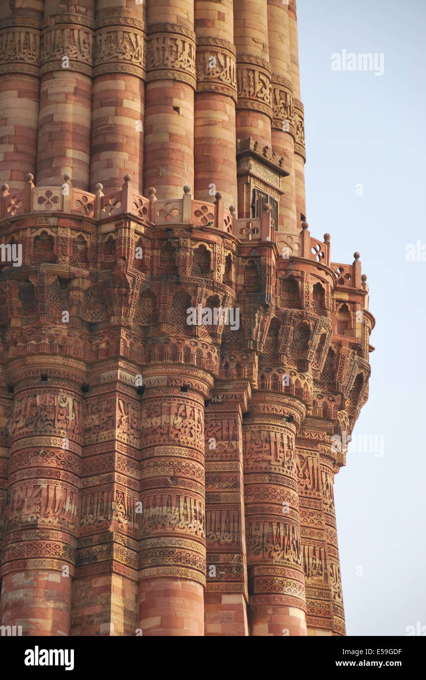 India. Delhi. Qutb Minar  is the tallest brick minaret in the world, and an important example of Indo-Islamic Architecture. Stock Photo