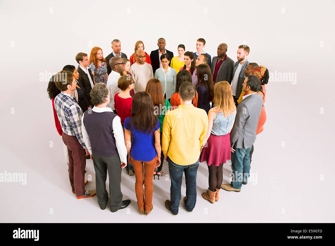 Business people in huddle Stock Photo