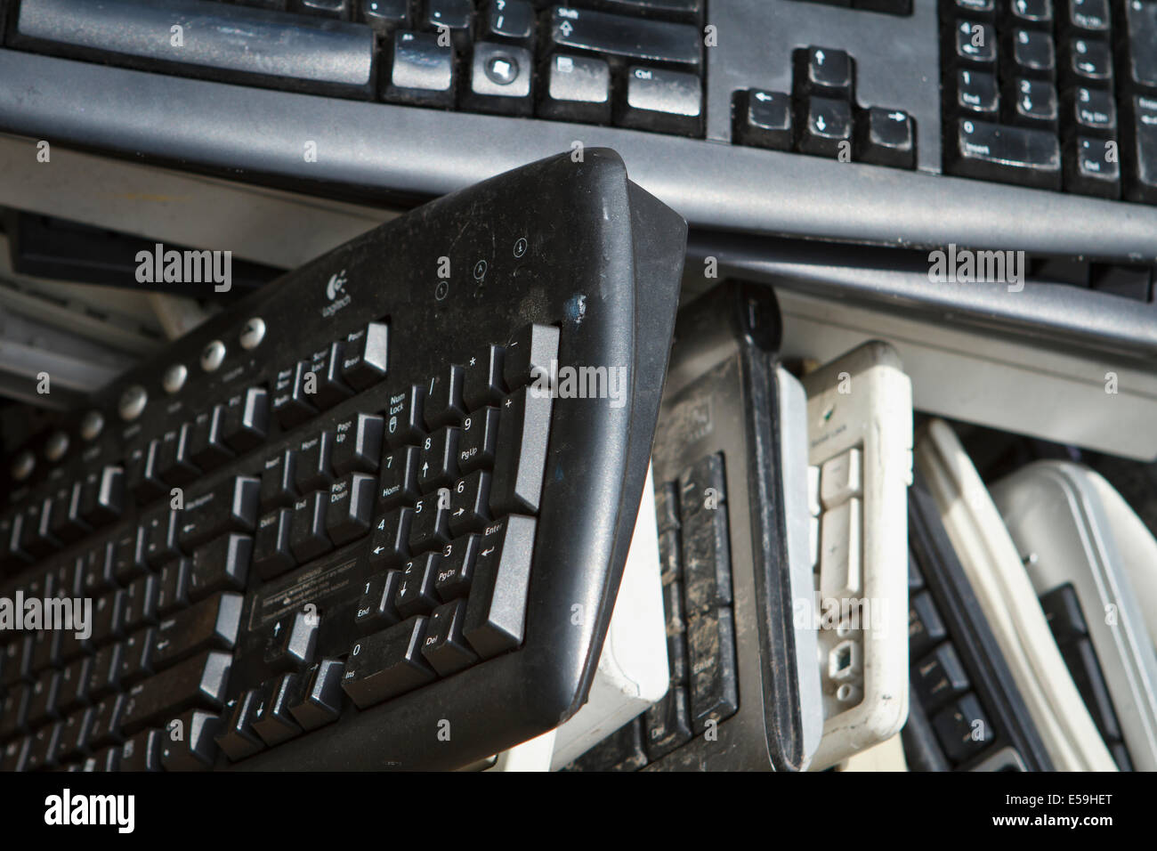 Pile of computer keyboards ready for recycling Stock Photo Alamy