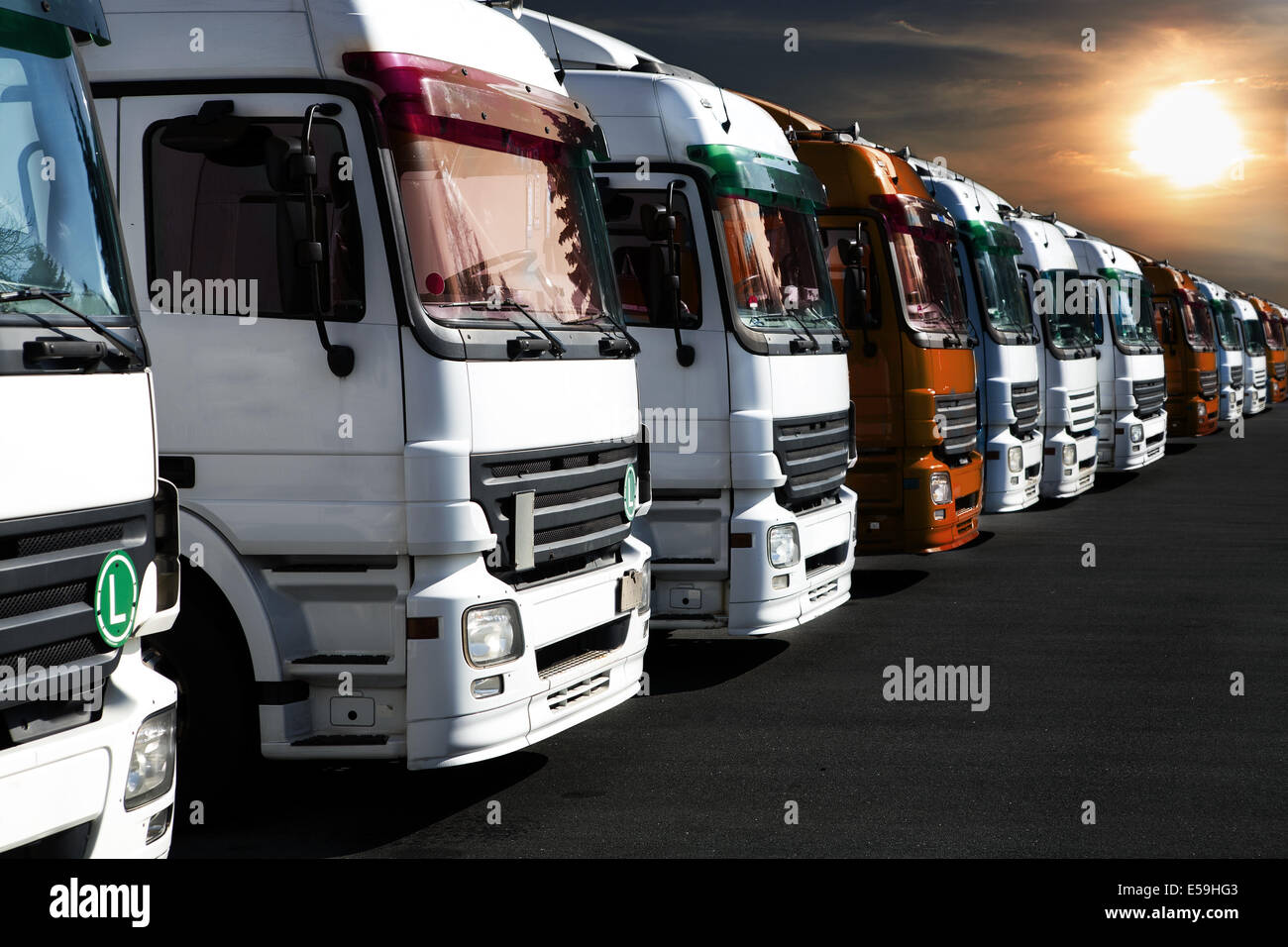 A line of trucks in the car park Stock Photo Alamy