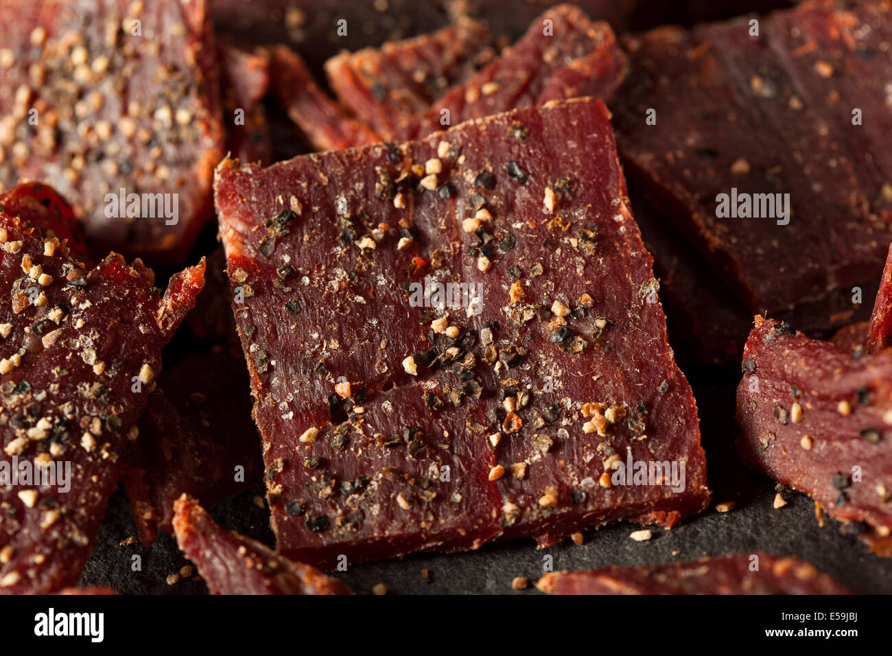 Dried Peppered Beef Jerky Cut in Strips Stock Photo Alamy