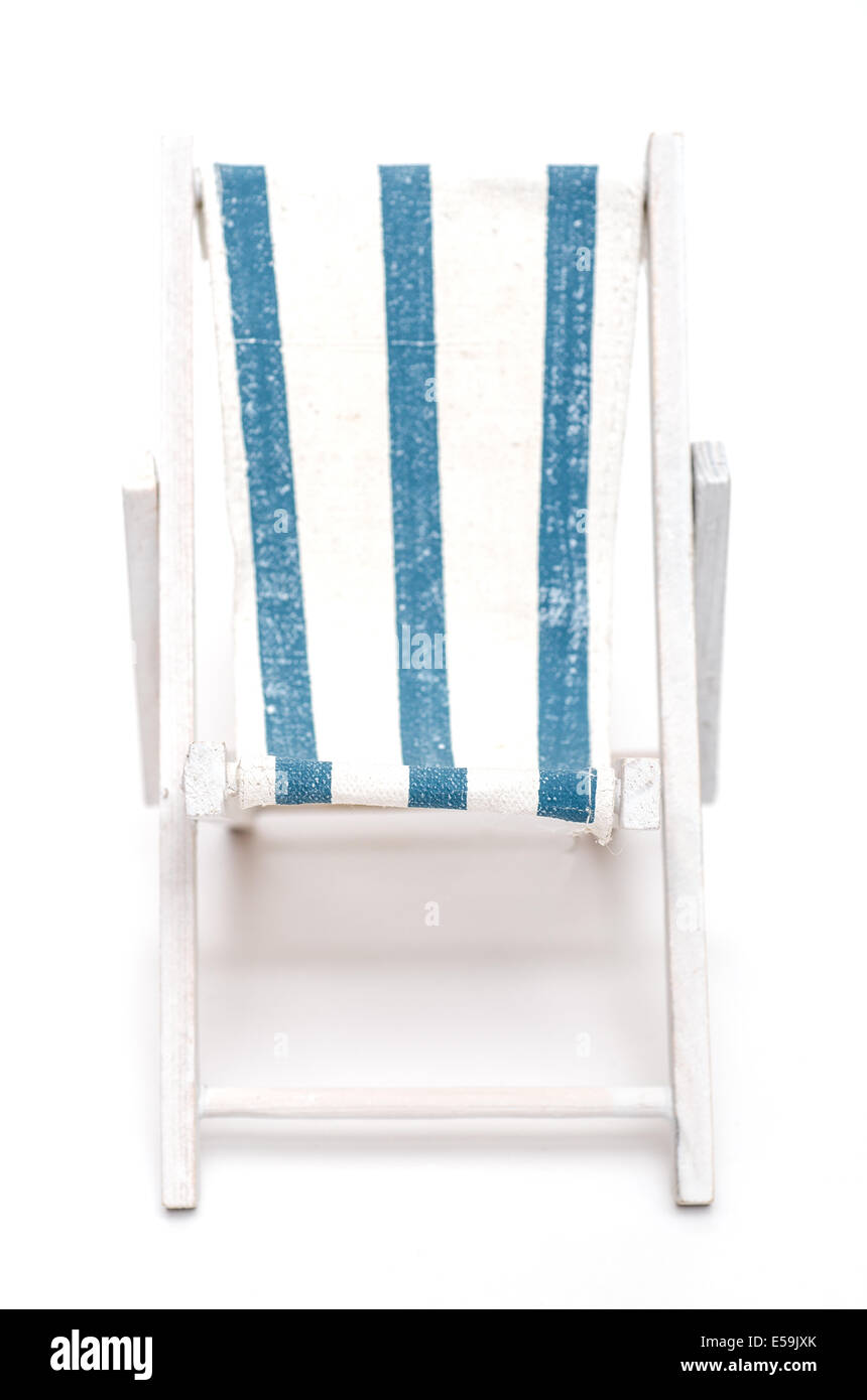 White isolated beach chair with blue and white stripes Stock Photo - Alamy