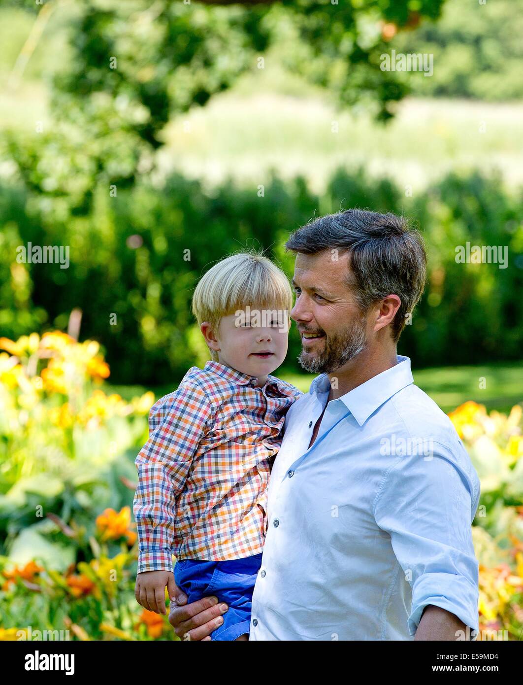 Danish Crown Prince Frederik and Prince Vincent attending a photo
