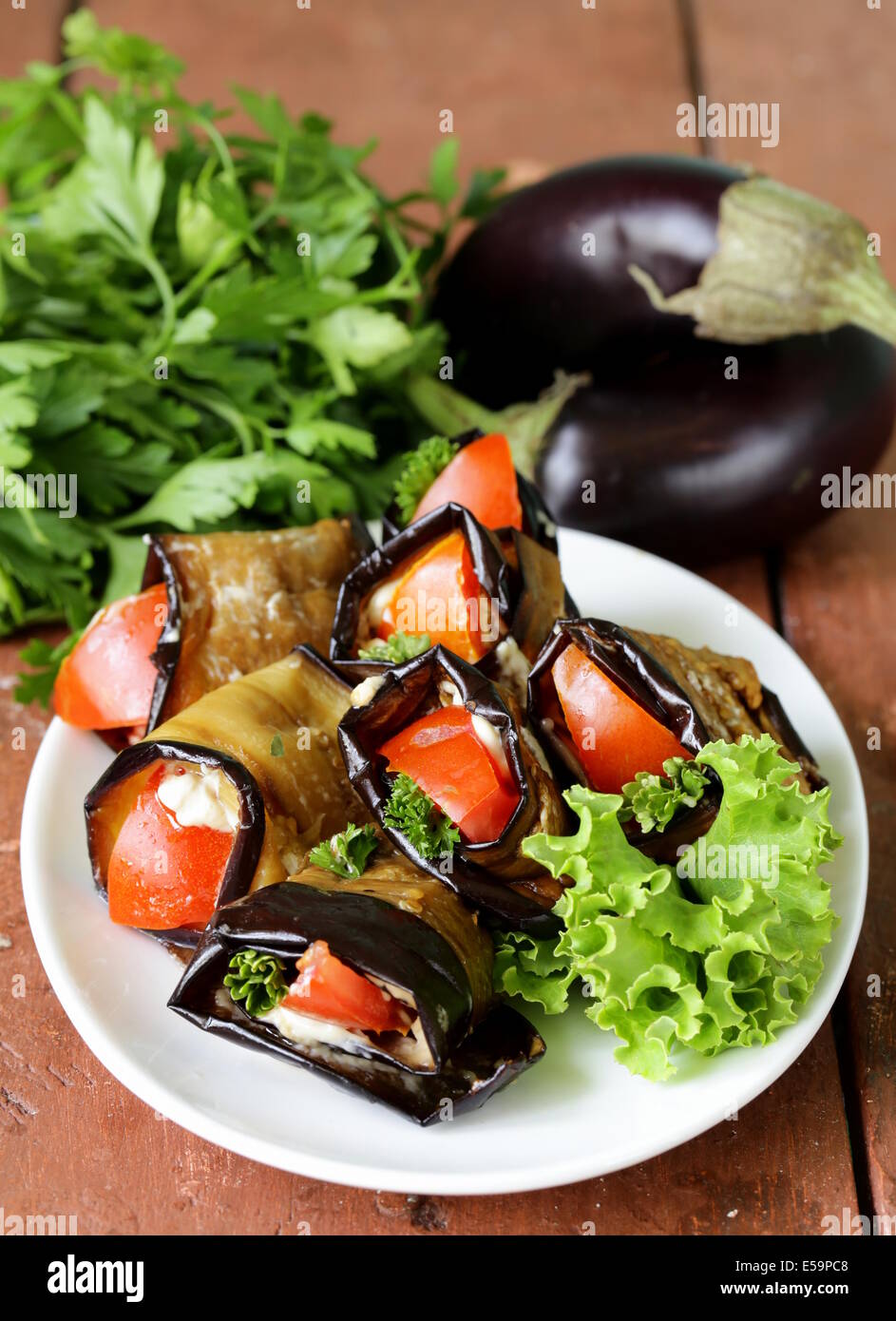 vegetable saute fried eggplant rolls with tomatoes Stock Photo Alamy