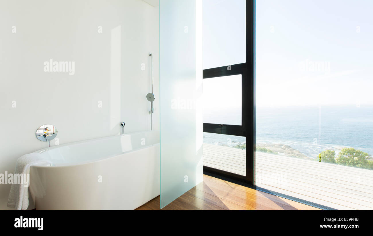 Bathtub And Sliding Glass Door Of Modern House Stock Photo