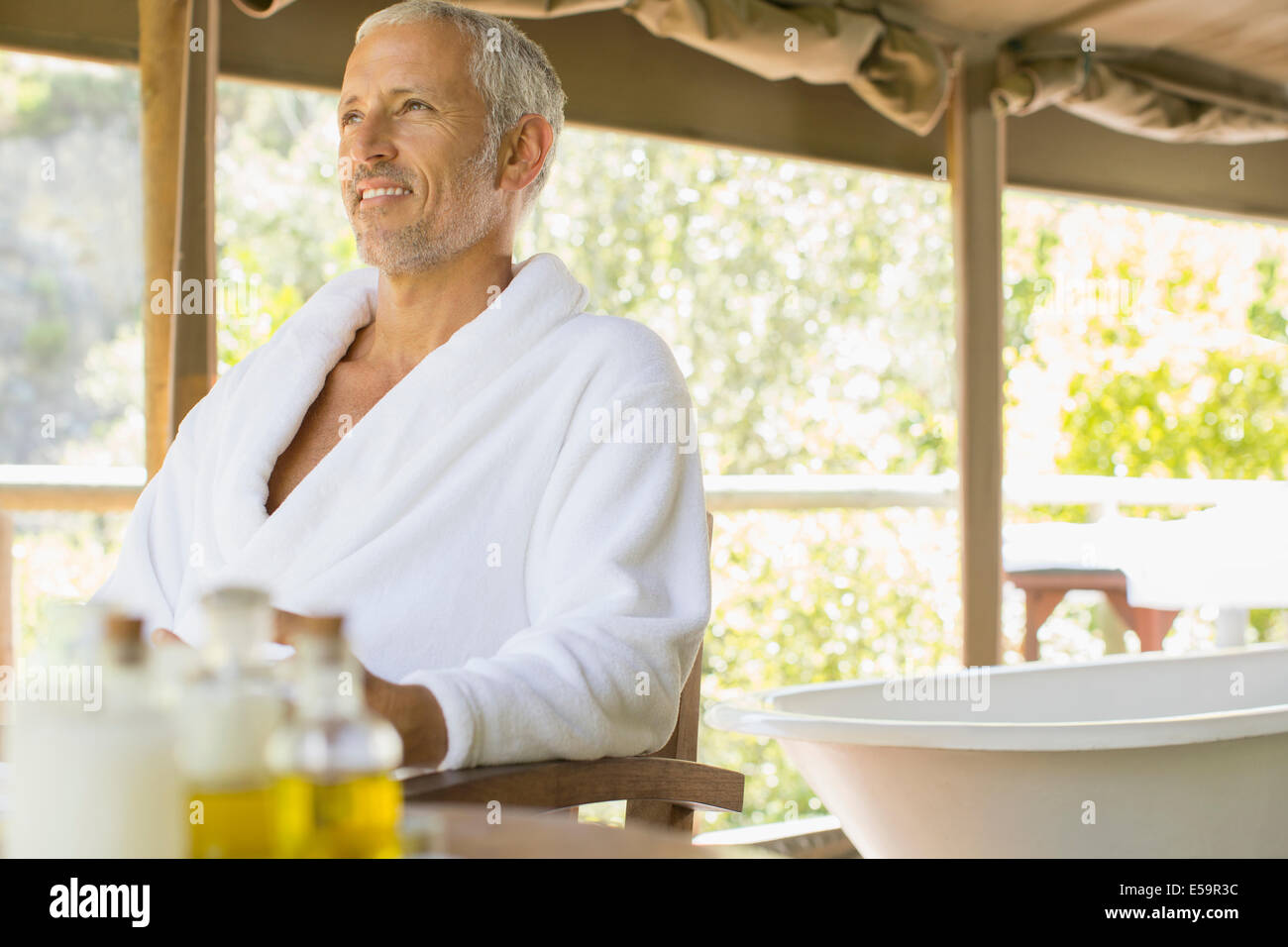 Man relaxing in spa Stock Photo