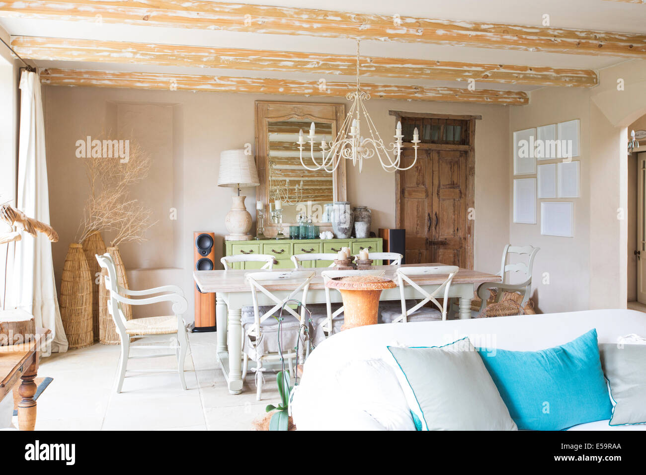 Living and dining area in rustic house Stock Photo
